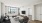 a living room with a tv, a couch and chairs