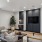 a living room with a tv and couches