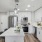 a kitchen with white cabinets