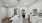 a kitchen with white cabinets