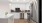 a kitchen with white cabinets
