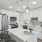a kitchen with white cabinets